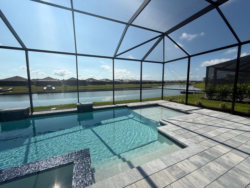 Exterior details and patio area of a home in Esplanade Lake Club, Fort Myers (Image 10).
