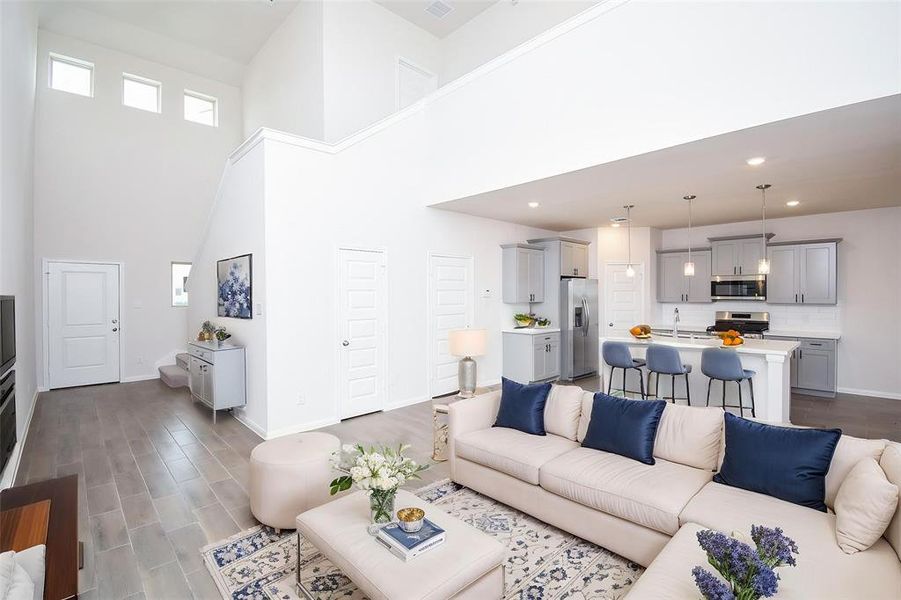 Picture yourself enjoying the sleek, easy-to-maintain flooring that extends throughout the main living areas. Picture yourself enjoying the sleek, easy-to-maintain flooring that extends throughout the main living areas.