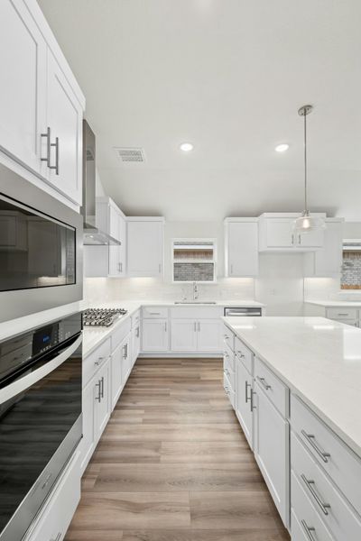 Furnished interior view inside a new home in University Heights, Round Rock (Image 14).