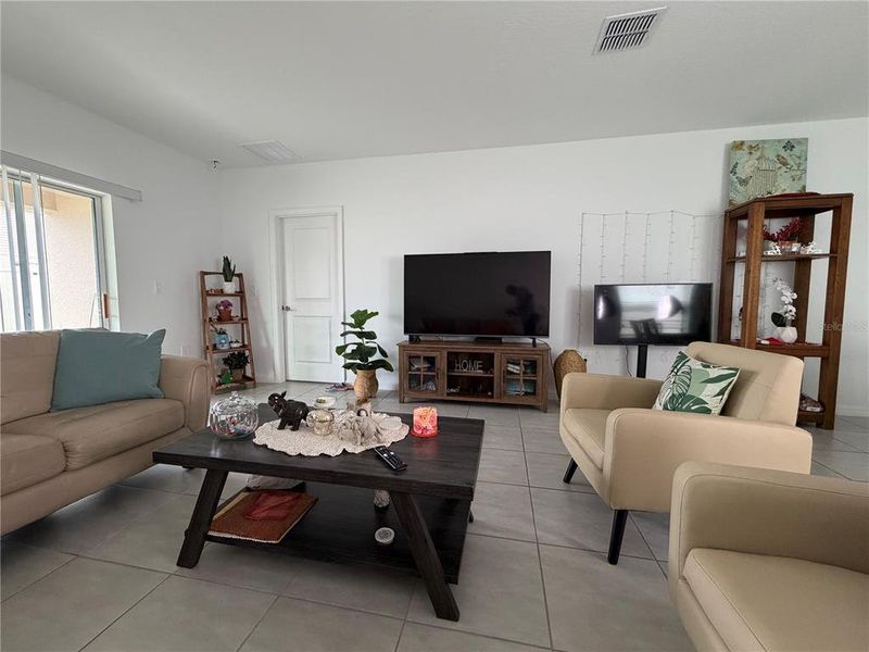 Furnished interior view inside a new home in Marion Creek, Haines City (Image 5).