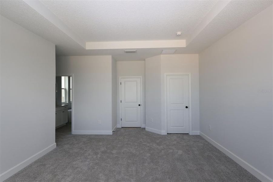 Spacious, unfurnished interior of a new home in Lake Star at Ovation, Winter Garden (Image 31).