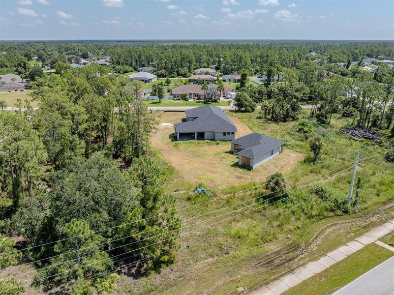Front exterior of a new home in , North Port, FL, highlighting curb appeal (Image 8).
