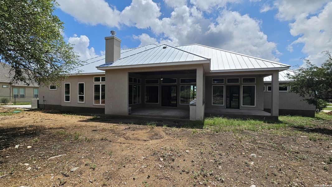 Exterior details and patio area of a home in , New Braunfels (Image 32).