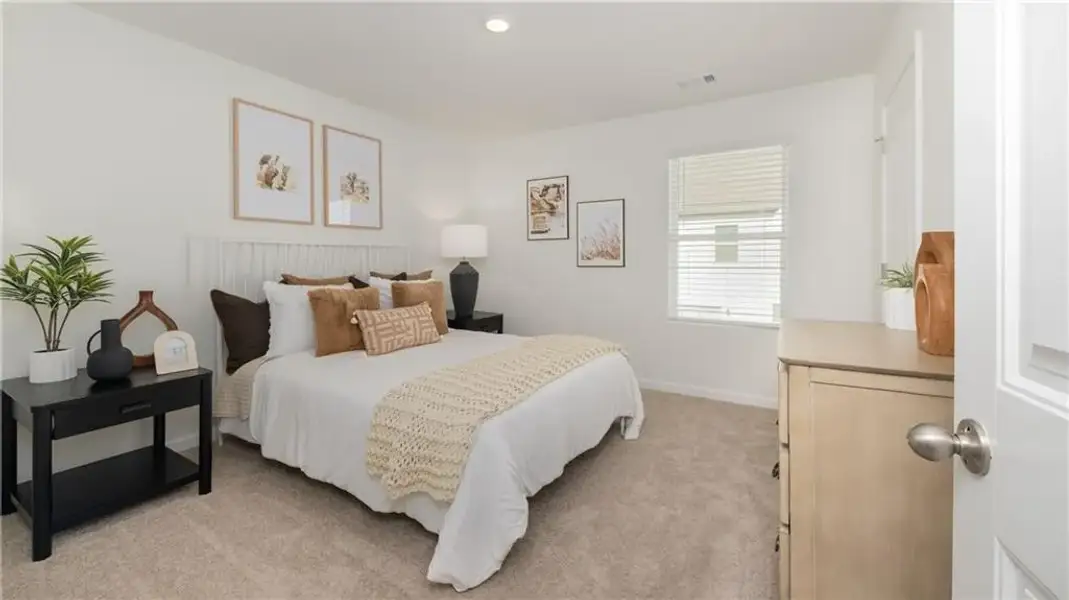 Furnished interior view inside a new home in Harvest Park, Decatur (Image 8).