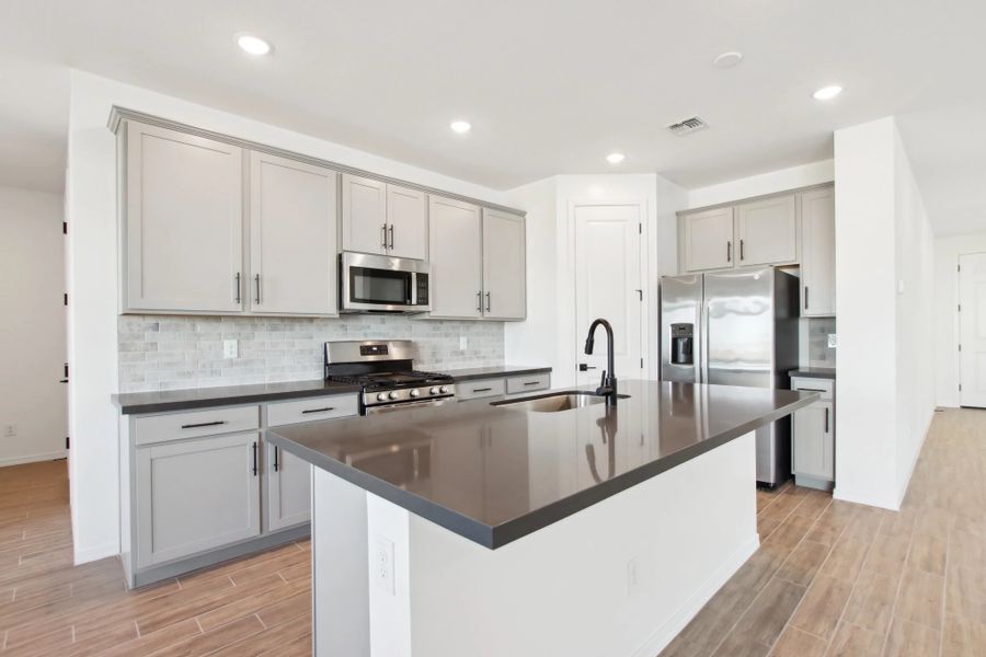 Representative furnished interior of a home built from the Daisy by Ashton Woods in Retreat at Stonebridge Manor, Waddell (Image 7).