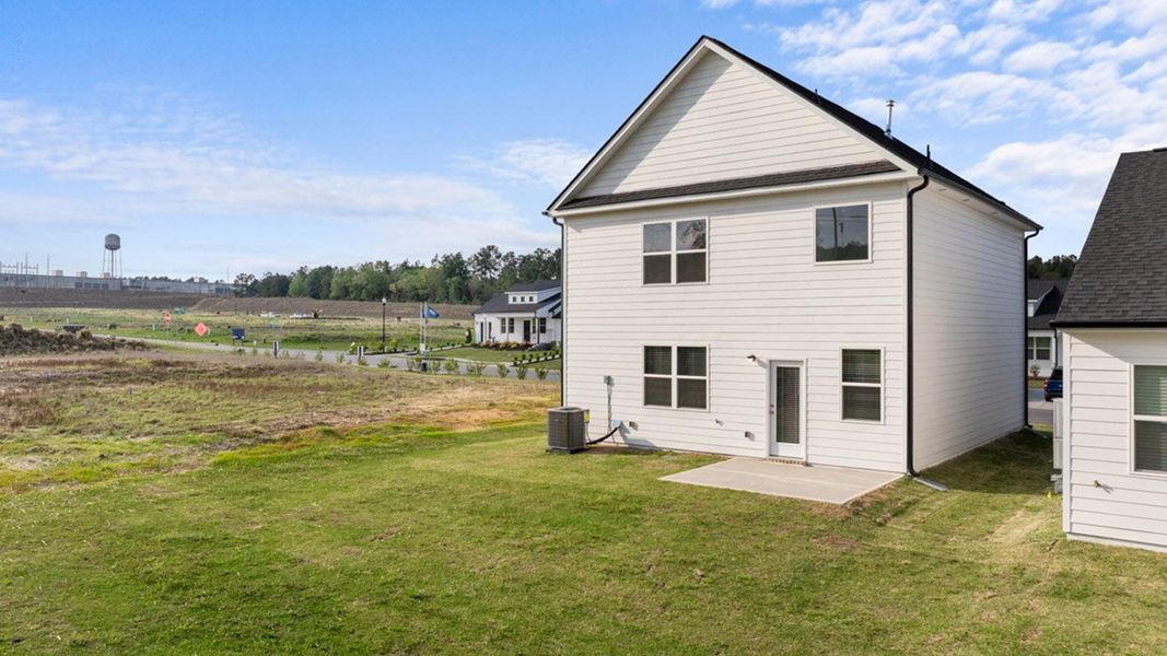 Exterior details and patio area of a home in The Islands, Beech Island (Image 25).