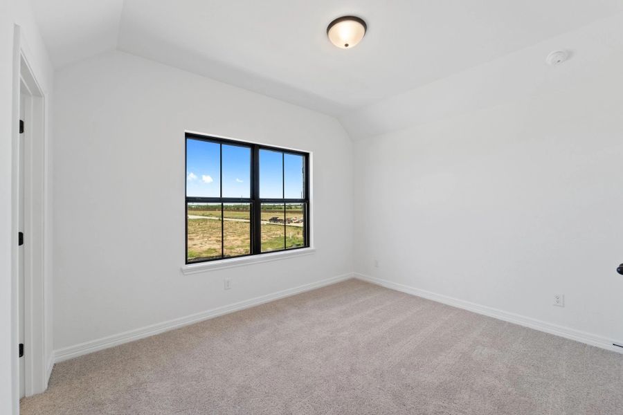 Fourth bedroom with private bath. Note: Sample product photo. Actual exterior and interior selections may vary by homesite. Photo may be virtually staged