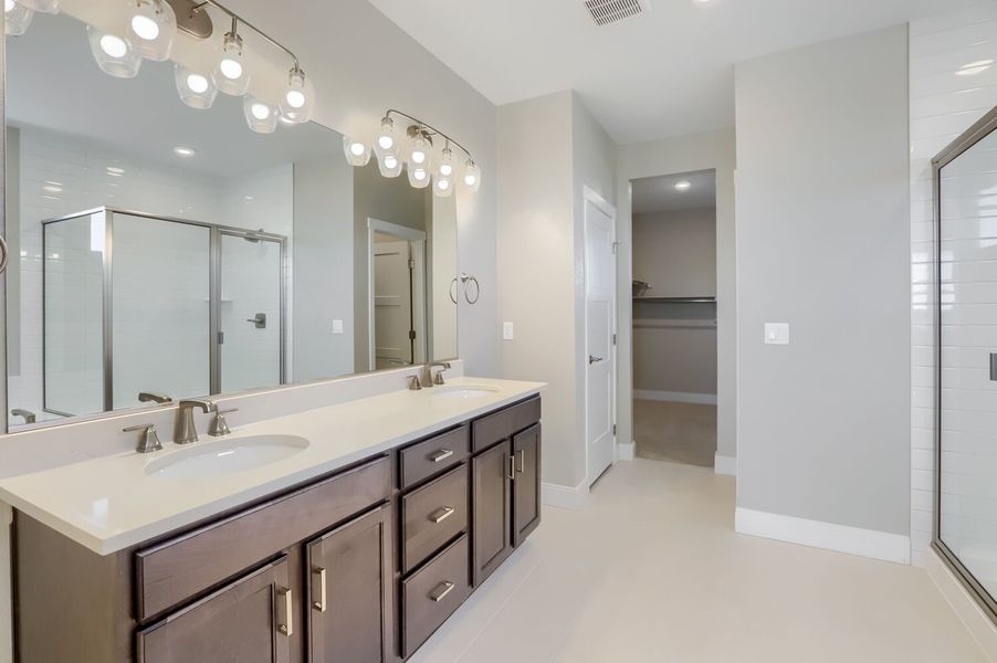 Furnished interior view inside a new home in Barefoot, Firestone (Image 4).