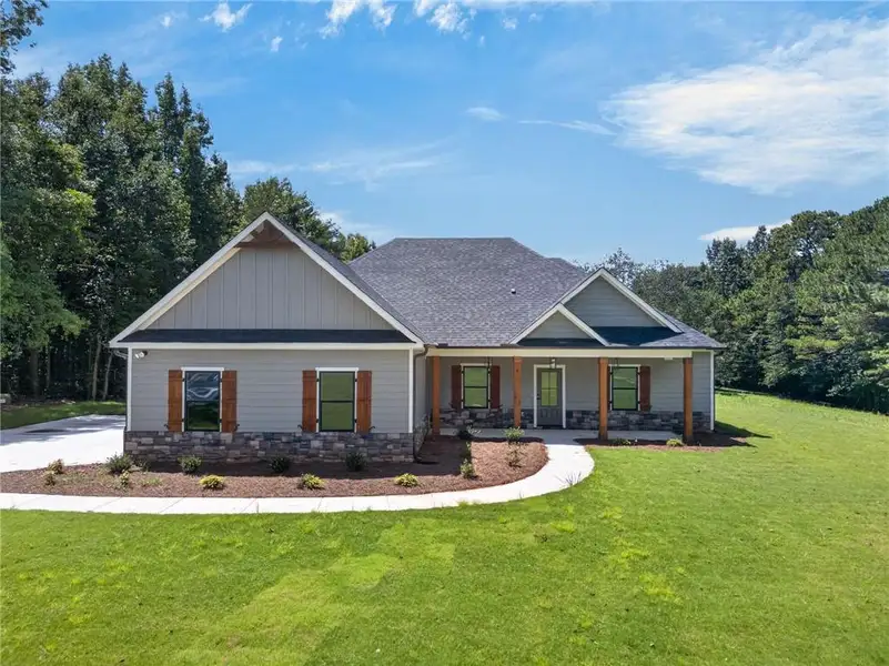 Front exterior of a new home in , Waco, GA, highlighting curb appeal (Image 21).