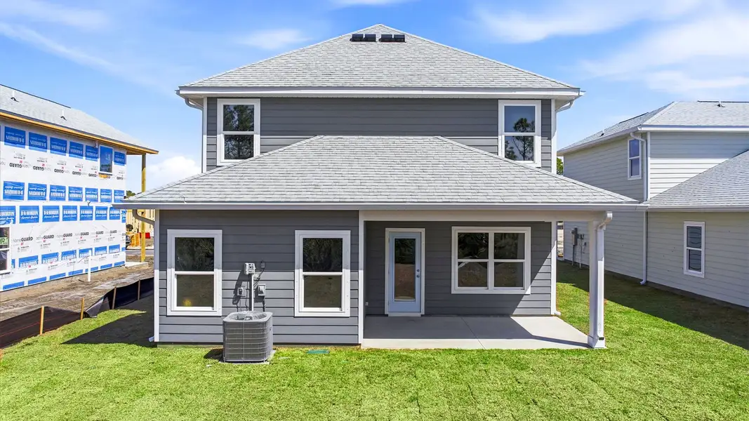 Exterior details and patio area of a home in Buffer Farms, Port Saint Joe (Image 3).