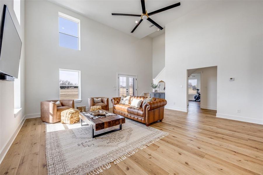 Another view of the living area showcasing the windows and views.