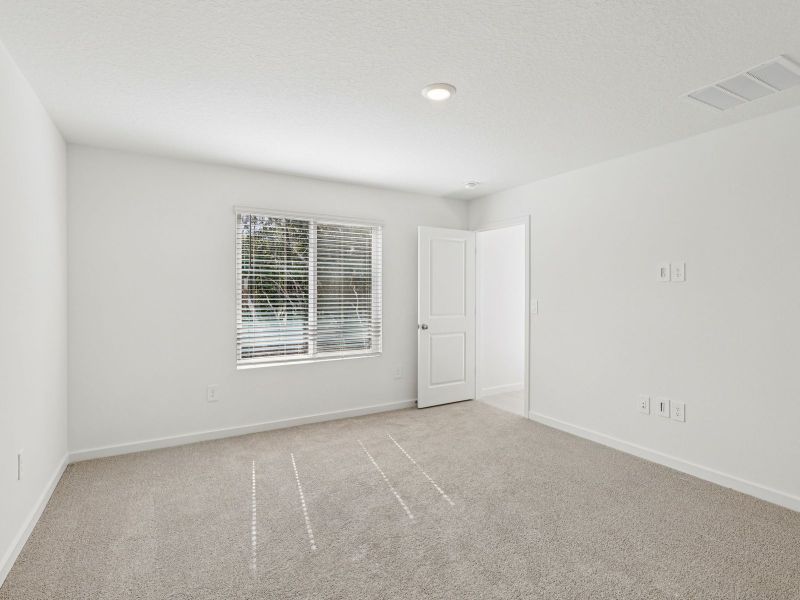 Spacious, unfurnished interior of a new home in Flagler Village - Classic Series, Palm Coast (Image 16).