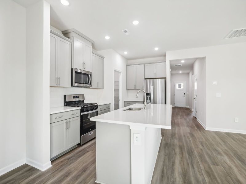 Kitchen in the Chandler floorplan at 253 White Birch Lane in Angier, NC.