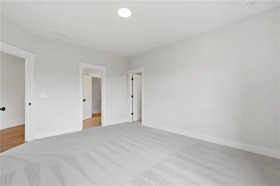 Spacious, unfurnished interior of a new home in Malone's Pond, Ball Ground (Image 27).