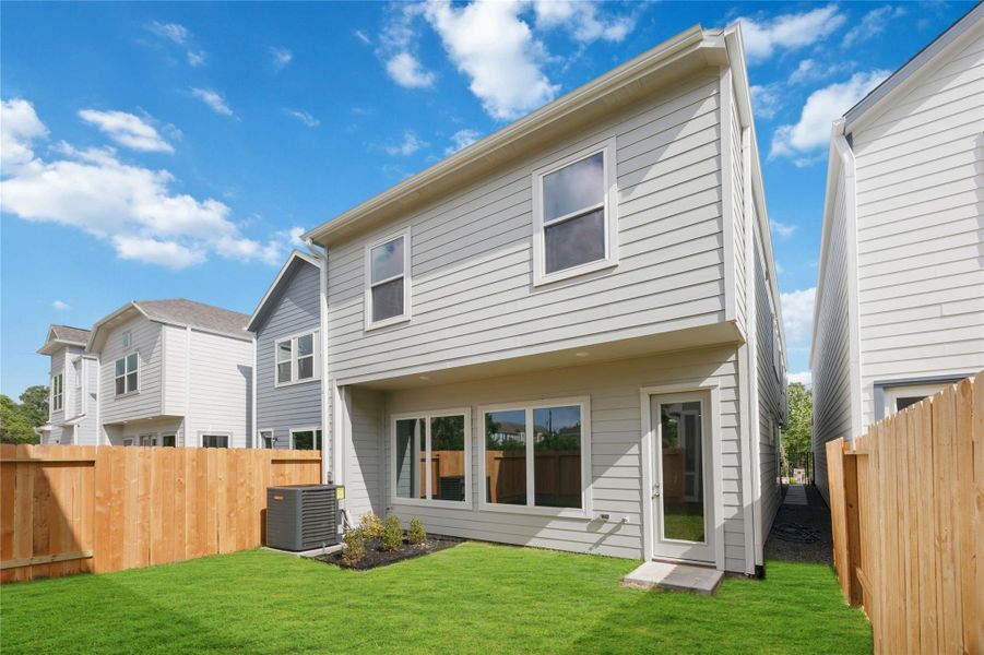 Backyard Bliss: A private, fenced retreat awaits just outside your door, with a spacious yard ready for entertaining, play, or simply soaking up the Houston sunshine.