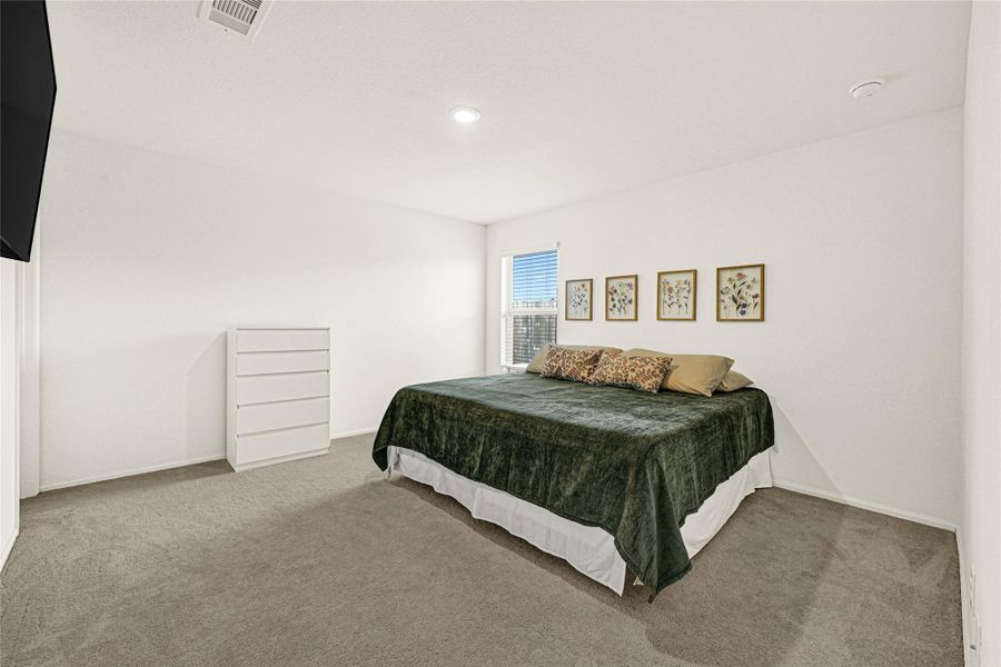 Furnished interior view inside a new home in Townsend Reserve: Cottage Collection, Splendora (Image 6). Furnished interior view inside a new home in Townsend Reserve: Cottage Collection, Splendora (Image 6).