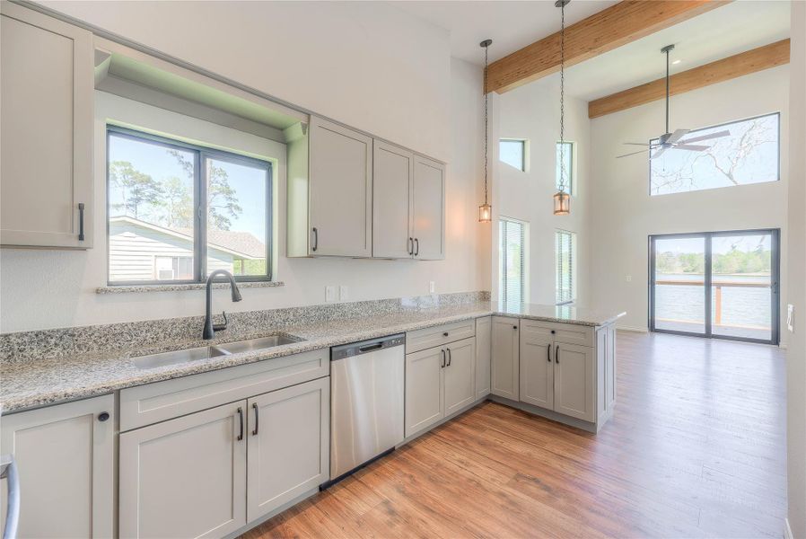 OPEN CONCEPT KITCHEN WITH A GREAT VIEW OF LAKE LIVINGSTON