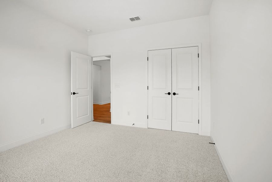 Spacious, unfurnished interior of a new home in Forest Creek, Waxhaw (Image 50).