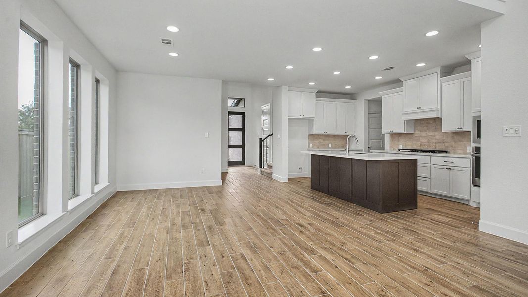 Furnished interior view inside a new home in Bridgeland, Cypress (Image 7).