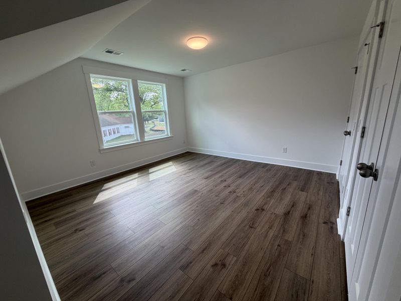 Spacious, unfurnished interior of a new home in Central Estates, Summerville (Image 26).