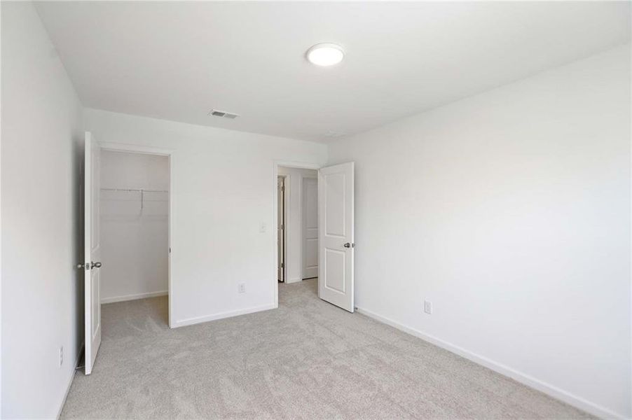 Spacious, unfurnished interior of a new home in The Pointe at Heron Bay, Locust Grove (Image 13).