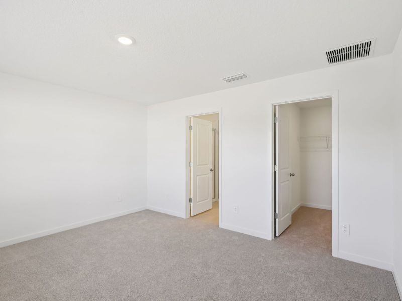 Spacious, unfurnished interior of a new home in Flagler Village - Classic Series, Palm Coast (Image 12). Spacious, unfurnished interior of a new home in Flagler Village - Classic Series, Palm Coast (Image 12).