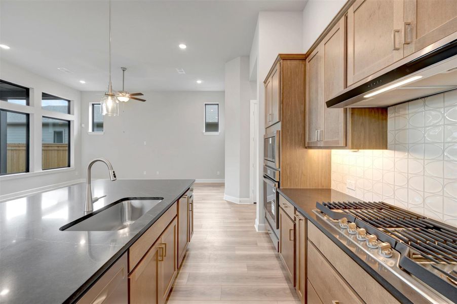 Furnished interior view inside a new home in Sienna - Landmark Row Collection, Missouri City (Image 8).