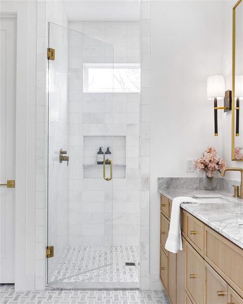 Bathroom with vanity and an enclosed shower