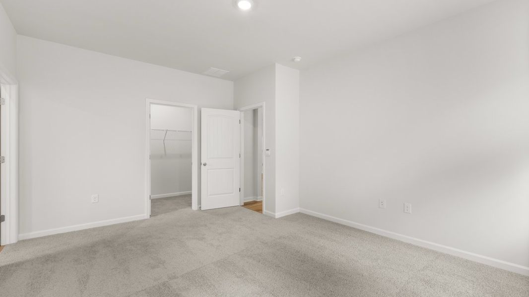 Representative unfurnished interior of a home built from the Booth by D.R. Horton in Grandview at Lanier, Dawsonville (Image 27).