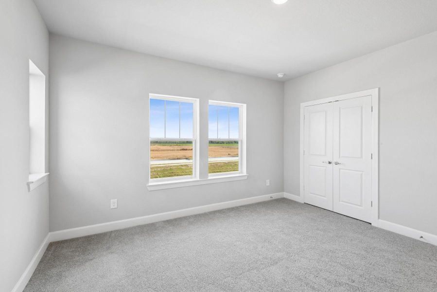 Spacious, unfurnished interior of a new home in Riceland 50’ Alley Load Homesites, Mont Belvieu (Image 11).