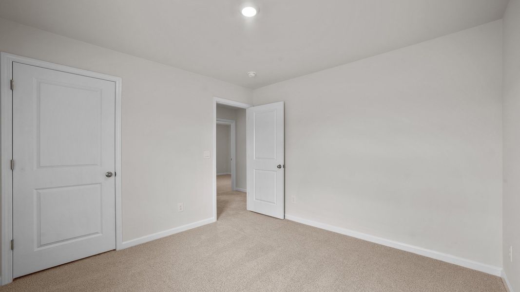 Spacious, unfurnished interior of a new home in Carter Ridge, Greenville (Image 27).
