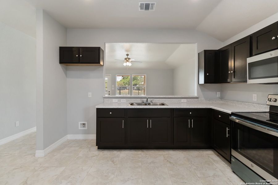 Furnished interior view inside a new home in , San Antonio (Image 5).