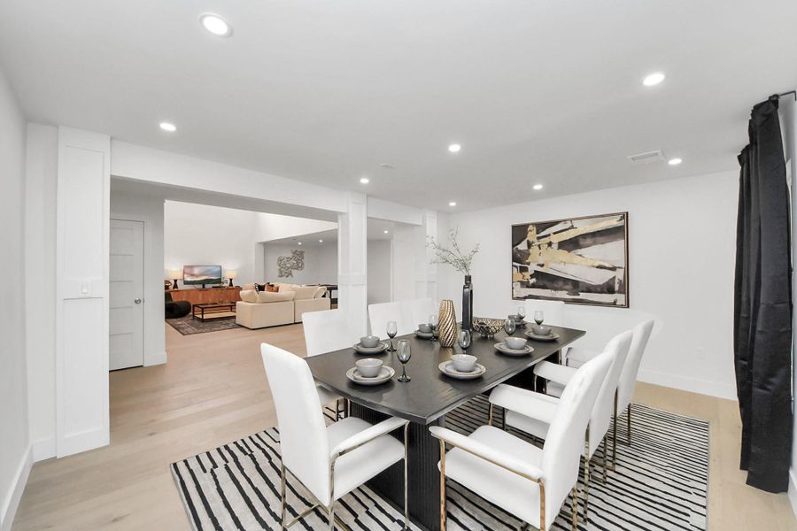 This showcases the open-concept space extending into the living area. This showcases the open-concept space extending into the living area.