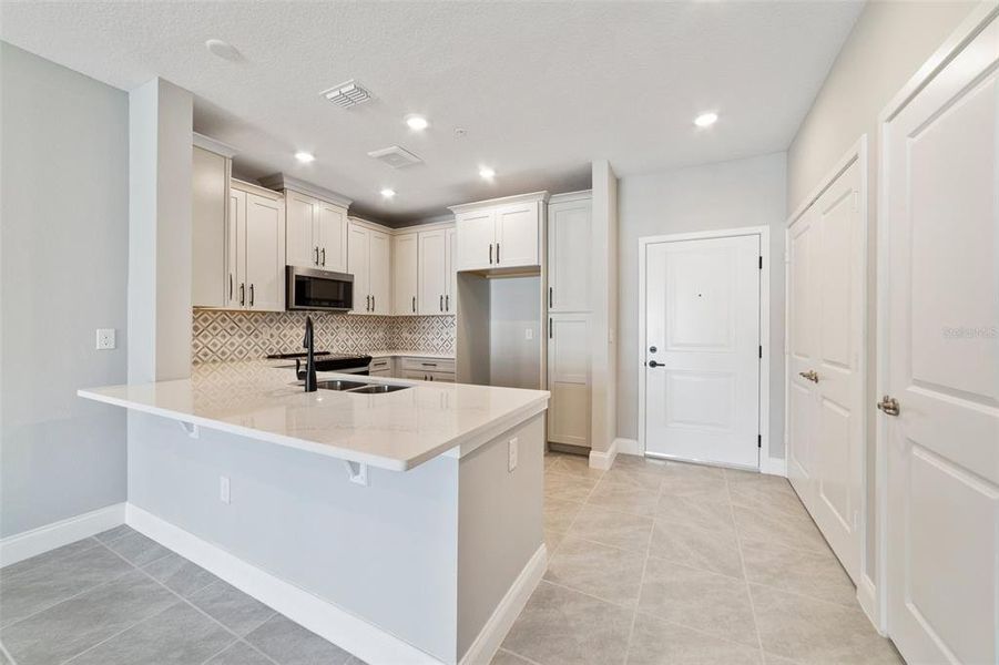 Furnished interior view inside a new home in Gatherings® of Lake Nona, Orlando (Image 12).