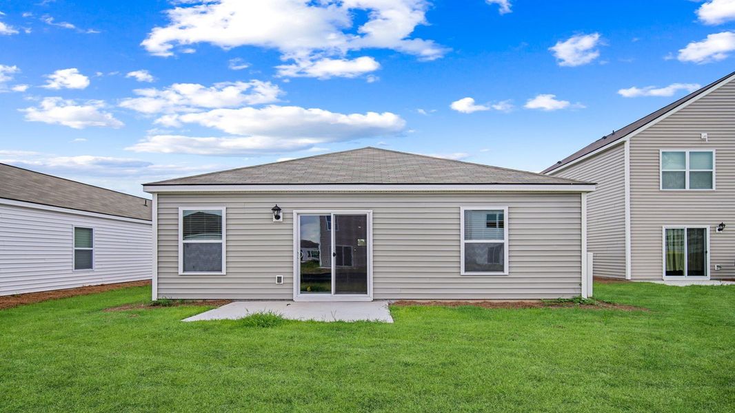 Front exterior of a new home in Rice Hope, Port Wentworth, GA, highlighting curb appeal (Image 2). Front exterior of a new home in Rice Hope, Port Wentworth, GA, highlighting curb appeal (Image 2).