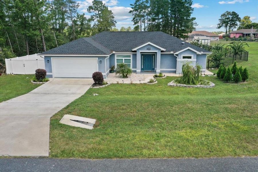 Front exterior of a new home in , Ocala, FL, highlighting curb appeal (Image 37). Front exterior of a new home in , Ocala, FL, highlighting curb appeal (Image 37).