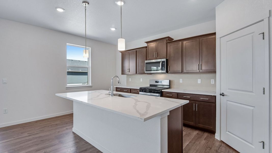 Furnished interior view inside a new home in Trails at Crowfoot, Parker (Image 9).