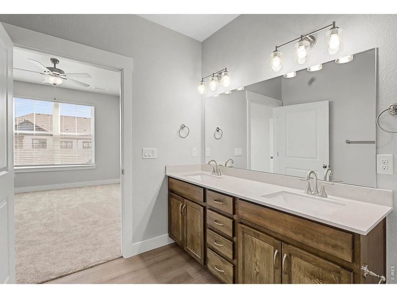 Furnished interior view inside a new home in Highlands at Fox Hill - The Flats, Longmont (Image 8).