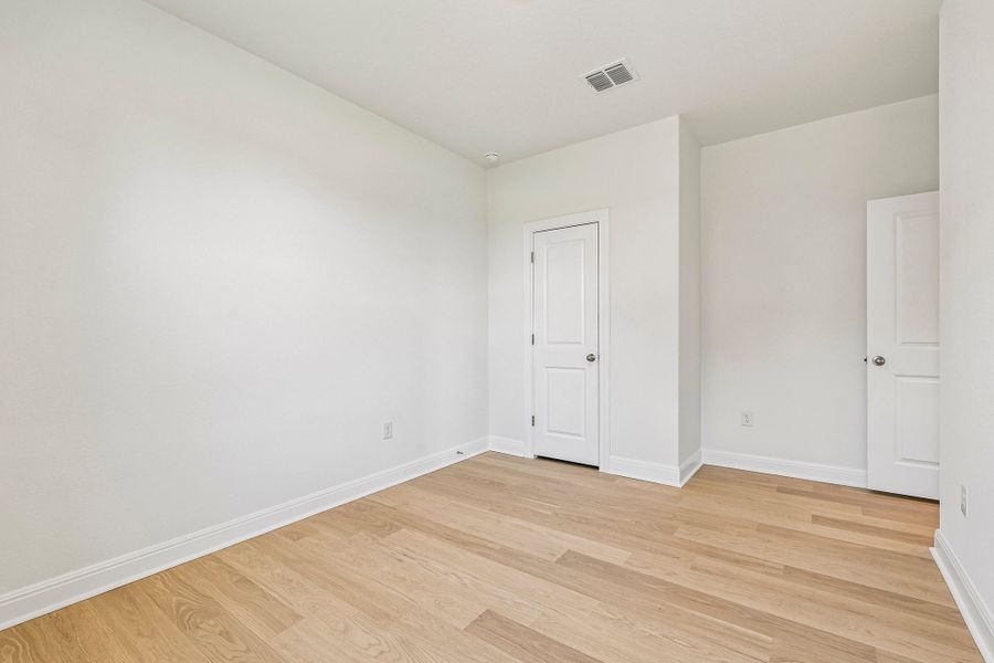 Spacious, unfurnished interior of a new home in Sage Hollow, Kyle (Image 20).