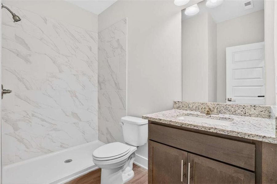 Furnished interior view inside a new home in The Fairways at Mirror Lake, Villa Rica (Image 7).