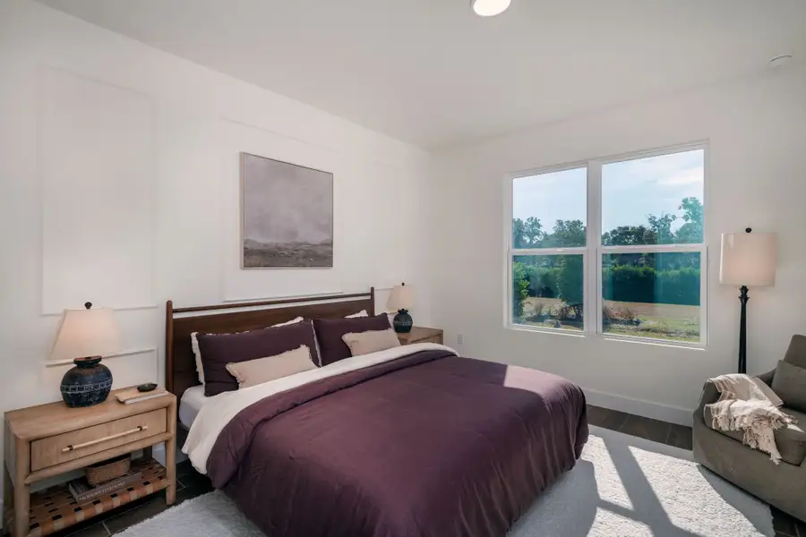 An inviting bedroom offering ample space, soft natural light, and flexibility for various living needs or décor styles. An inviting bedroom offering ample space, soft natural light, and flexibility for various living needs or décor styles.