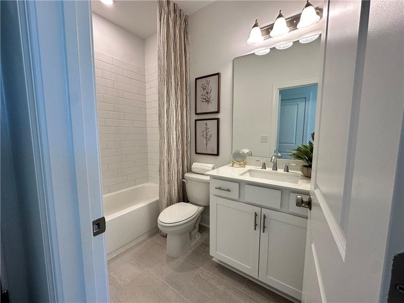 Furnished interior view inside a new home in Market Square at Sawnee Village, Cumming (Image 10).