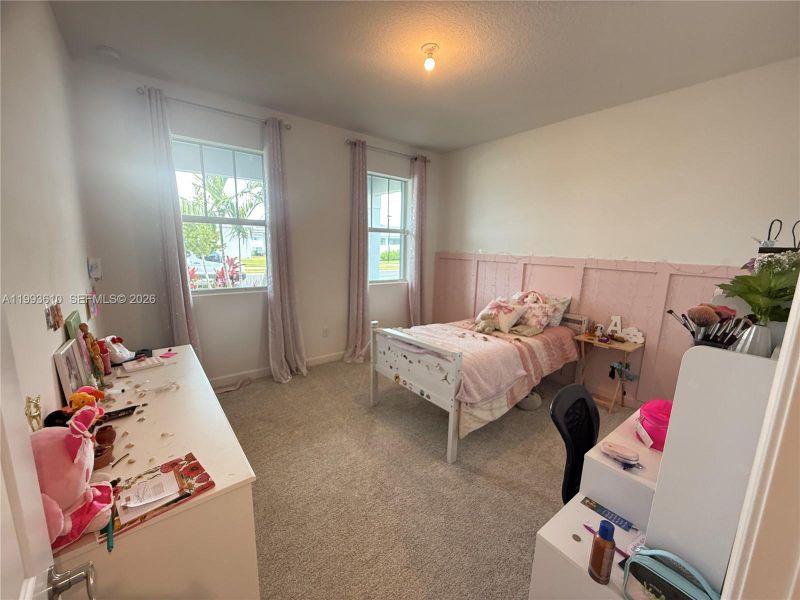 Furnished interior view inside a new home in Tradition, Port St. Lucie (Image 33).