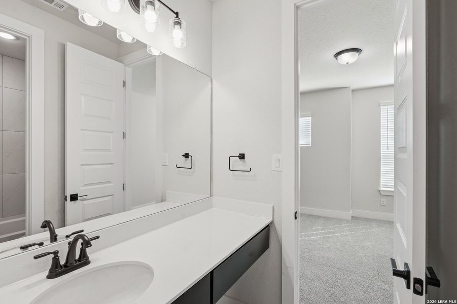 Furnished interior view inside a new home in Sienna Lakes, San Antonio (Image 7).