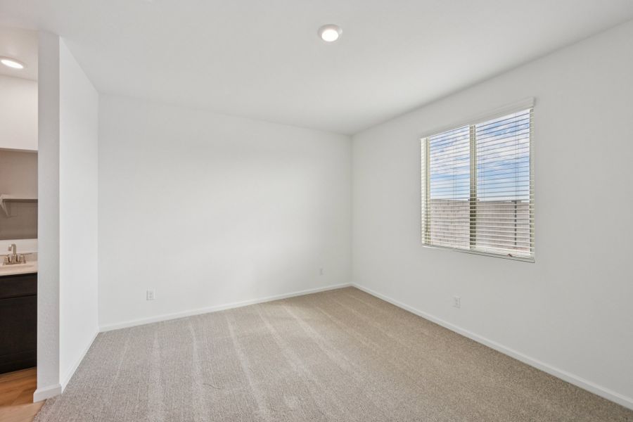 Primary suite. Finishes and options may vary by community