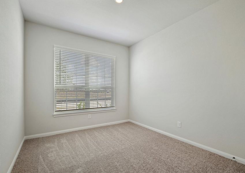 Beautiful window in a secondary bedroom overlooking the front yard Beautiful window in a secondary bedroom overlooking the front yard