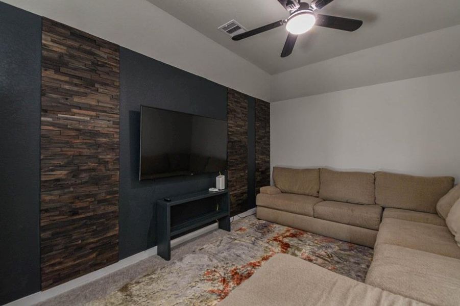 Amazing media room with a lot of custom work.