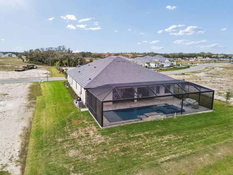 Exterior details and patio area of a home in River Preserve Estates, Parrish (Image 44).