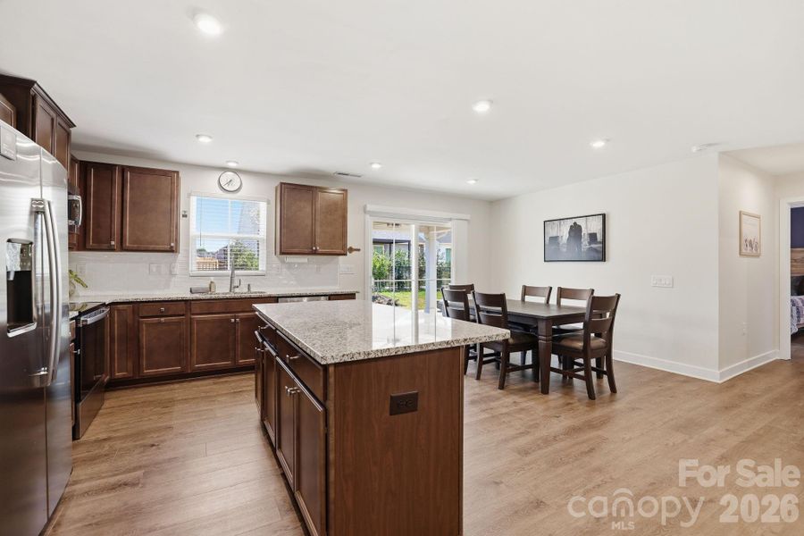 Kitchen opens to dining area