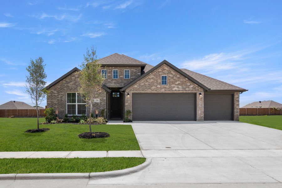 Front exterior of a new home in Waterford Park, Weatherford, TX, highlighting curb appeal (Image 1). Front exterior of a new home in Waterford Park, Weatherford, TX, highlighting curb appeal (Image 1).